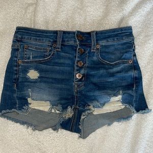 Distressed dark blue shorts from AE